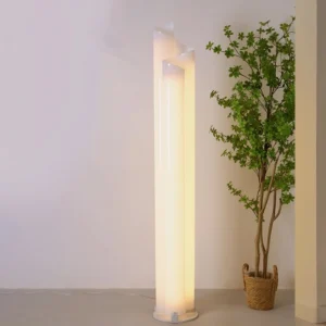 Illuminated Chimera floor lamp in modern living room with potted plant warm ambient light