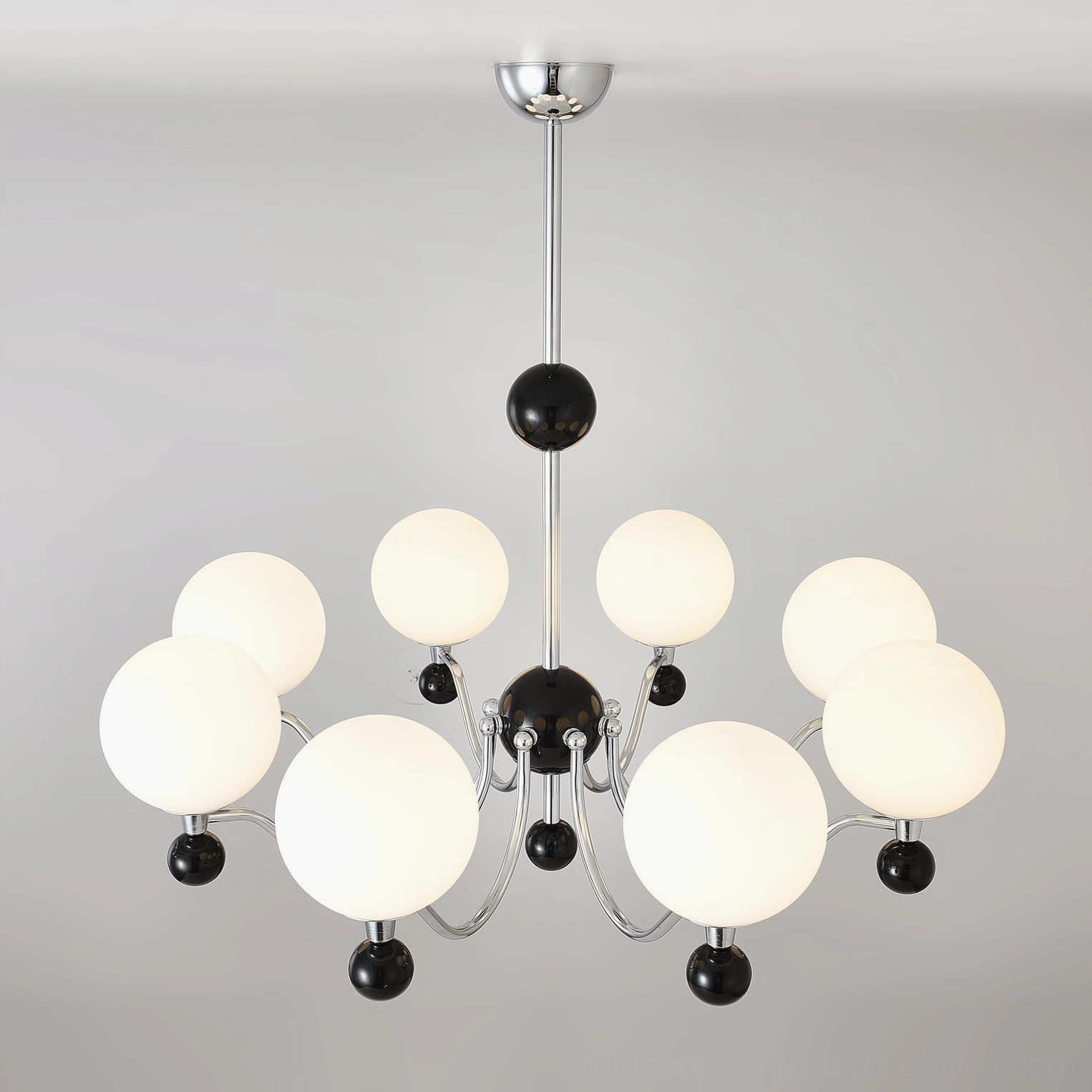 Multi-head chrome chandelier in scandinavian minimalist interior design setting
