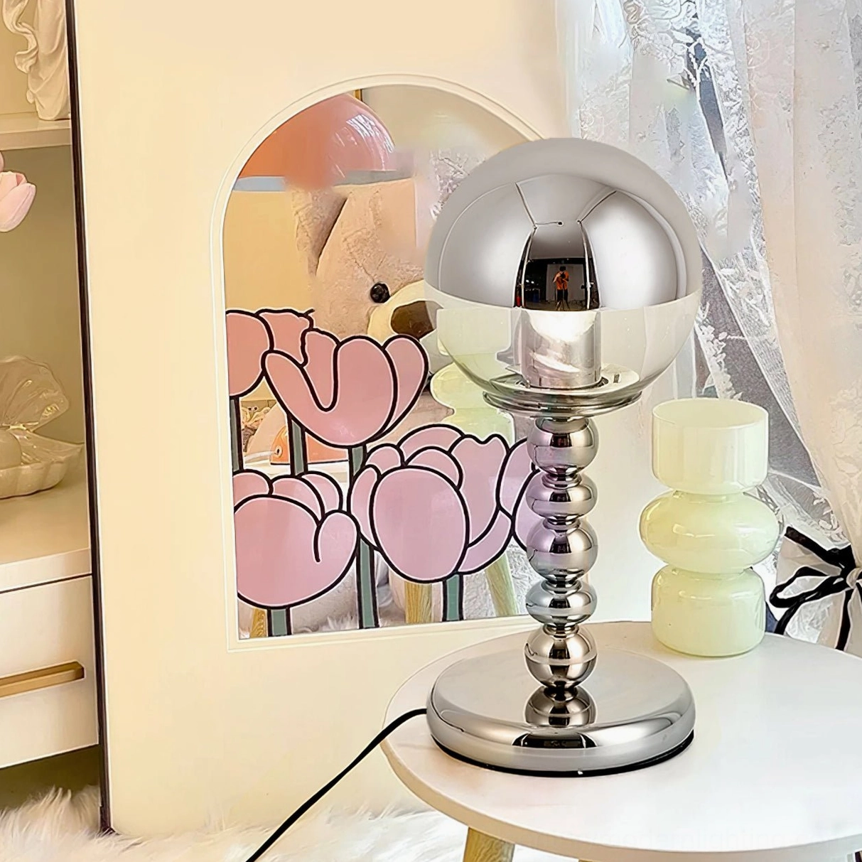 Chrome Mirrorball minimalist table lamp with half-mirrored glass sphere and polished metal base