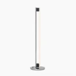 Minimalist chrome tube LED floor lamp frontal view with clean studio white background showing sleek vertical design