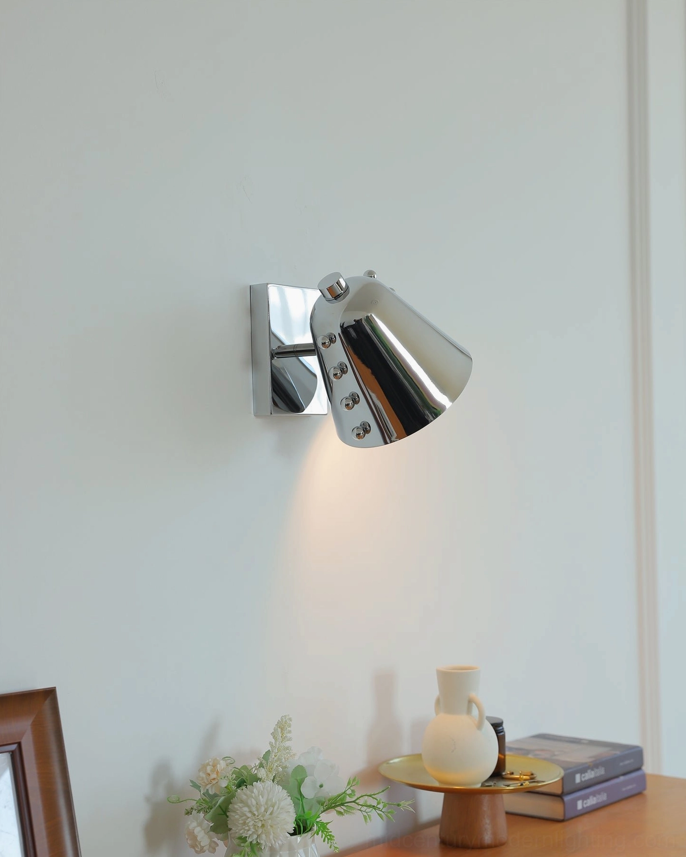 Chrome wall lamp upper side perspective angled silver shade with spherical stud accents contemporary