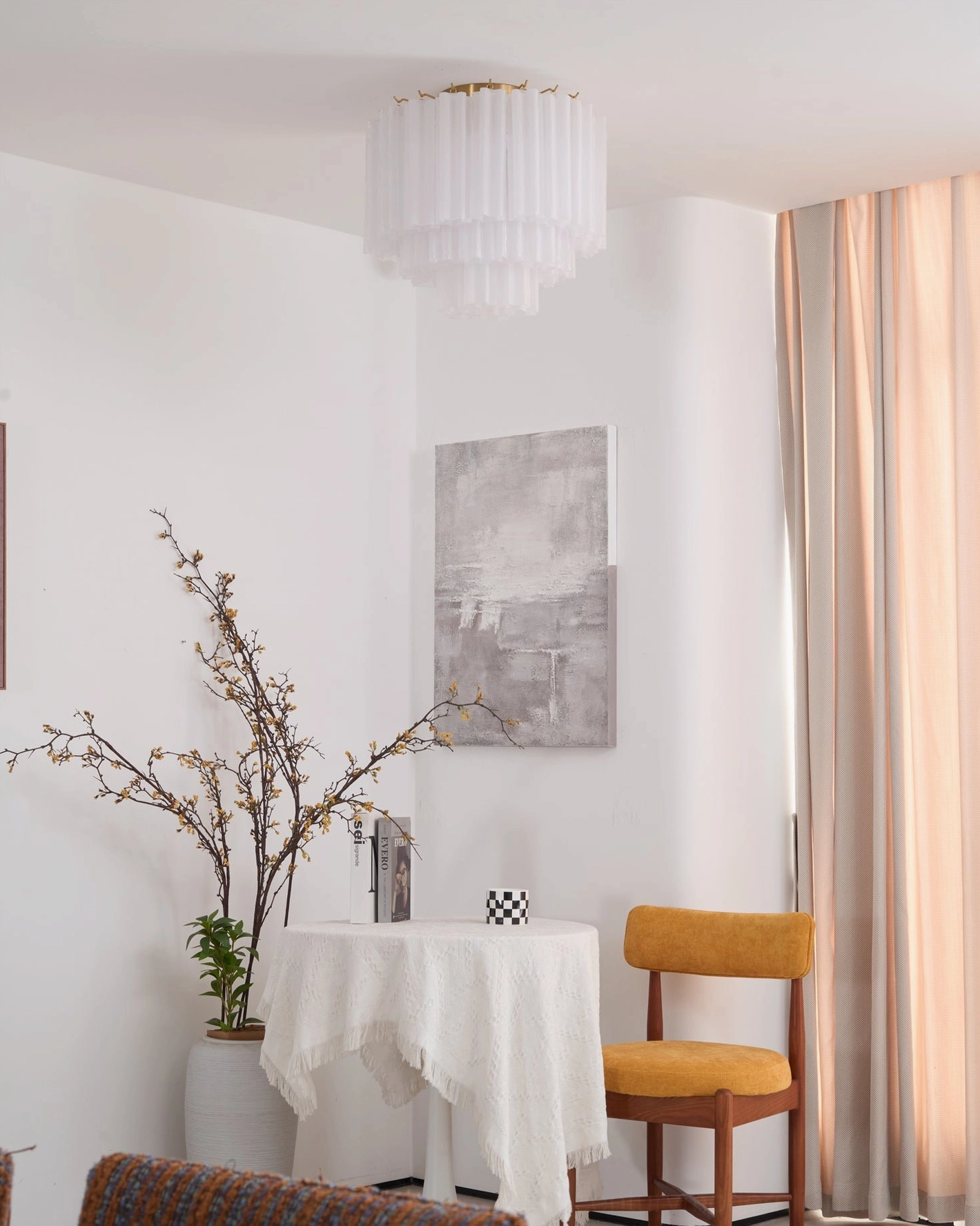 Chrono Tubular Ceiling Lamp installed in minimalist dining nook corner, warm neutral interior design aesthetic