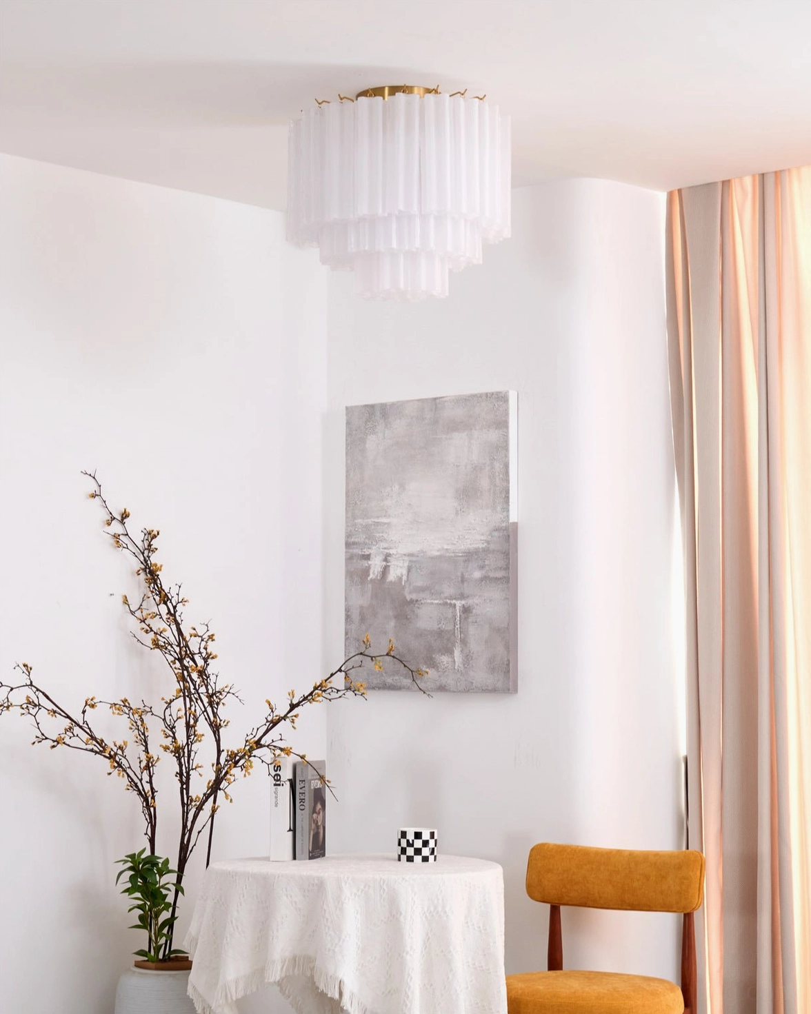 Chrono Tubular Ceiling Lamp installed in neutral minimalist indoor space showing white layered glass shade and brass fixture