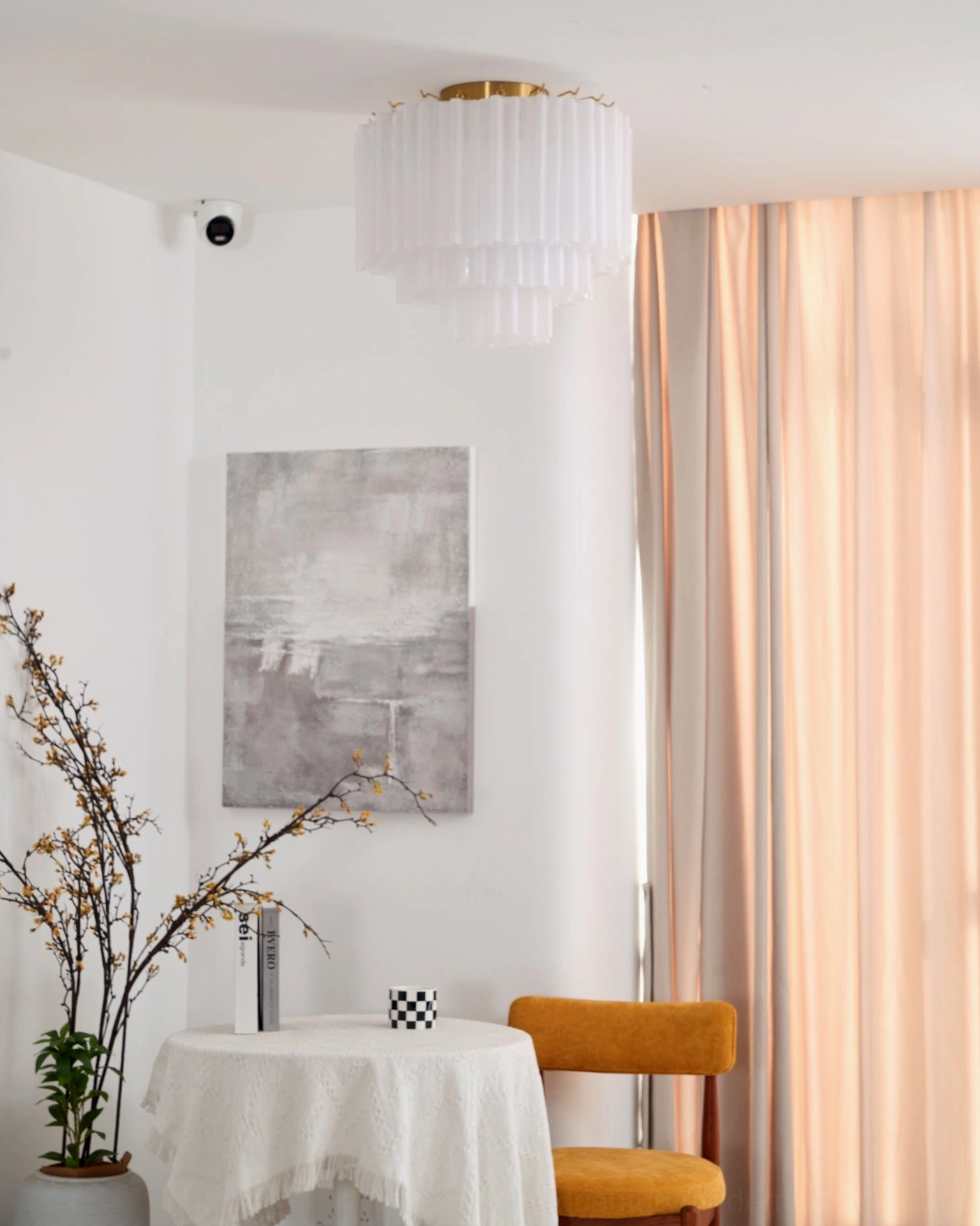 Chrono Tubular Ceiling Lamp side view mounted on ceiling in minimalist dining area, white fluted shade with brass base