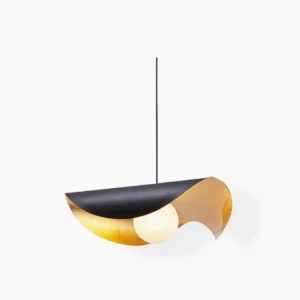 Cilla asymmetrical pendant lamp with black matte exterior and gold interior diffuser, frosted alabaster globe, front view on white background