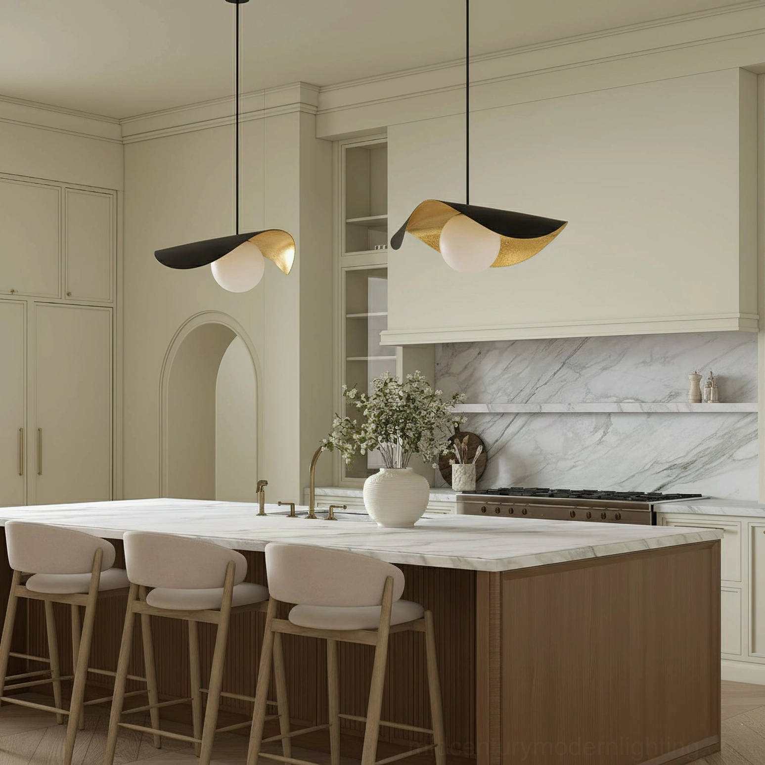 Double Cilla pendant lamps installed above modern kitchen island with light wood cabinetry, warm ambient lighting, eye-level perspective