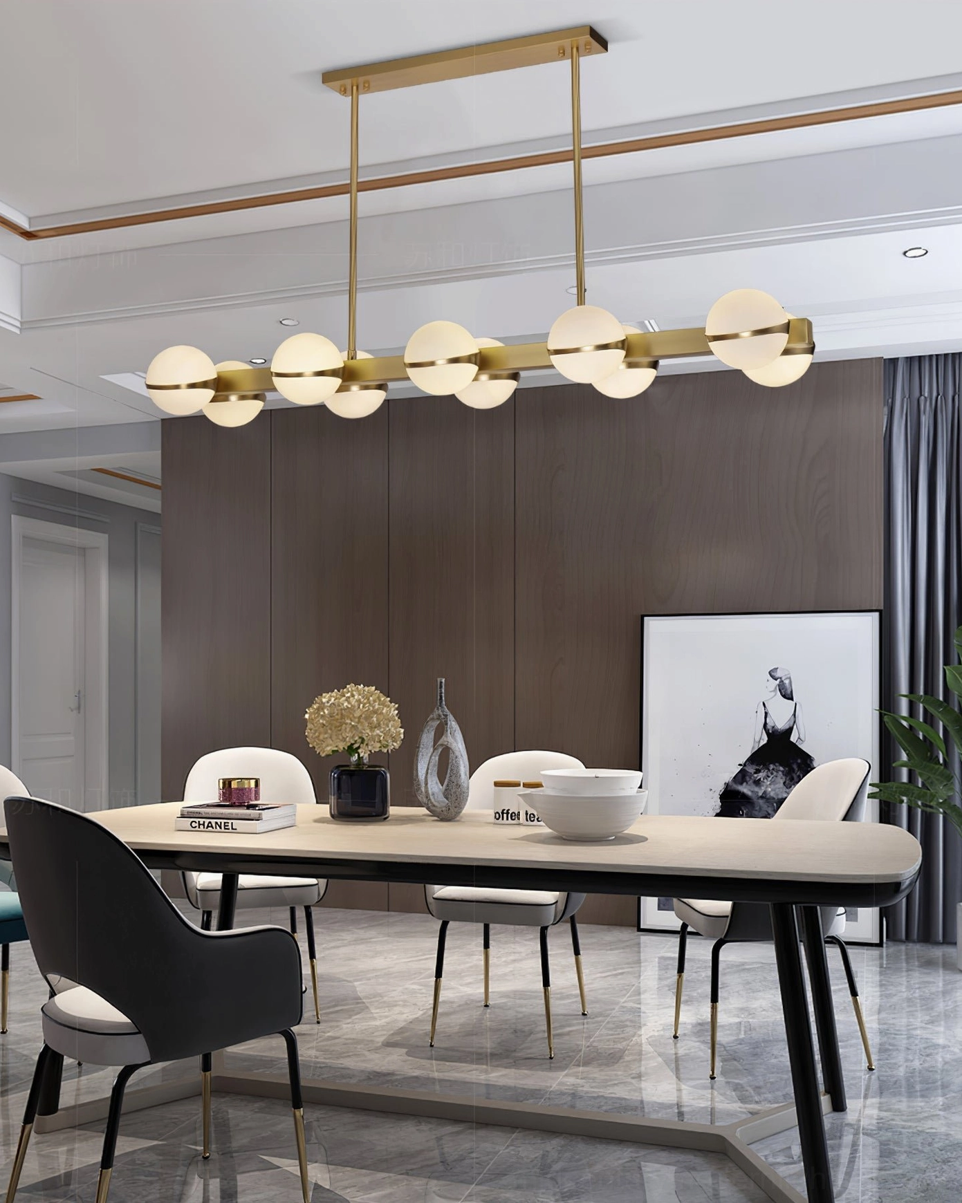 Circular modern brass chandelier with frosted glass shades in luxury dining room with fireplace, Grand Lustre collection