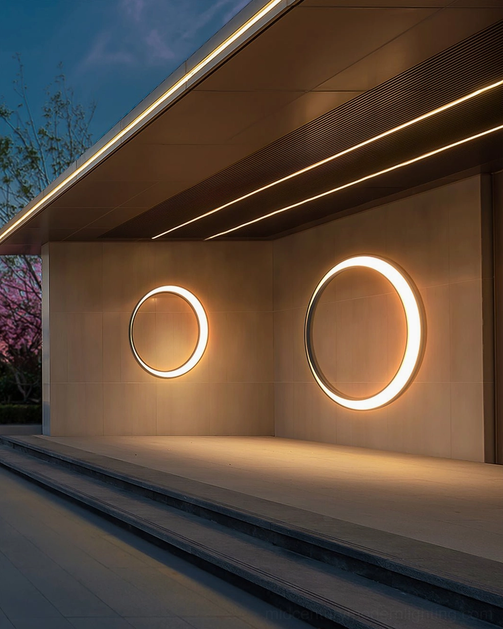 Contemporary circular LED outdoor wall lamp detail showing stainless steel frame and integrated LED technology