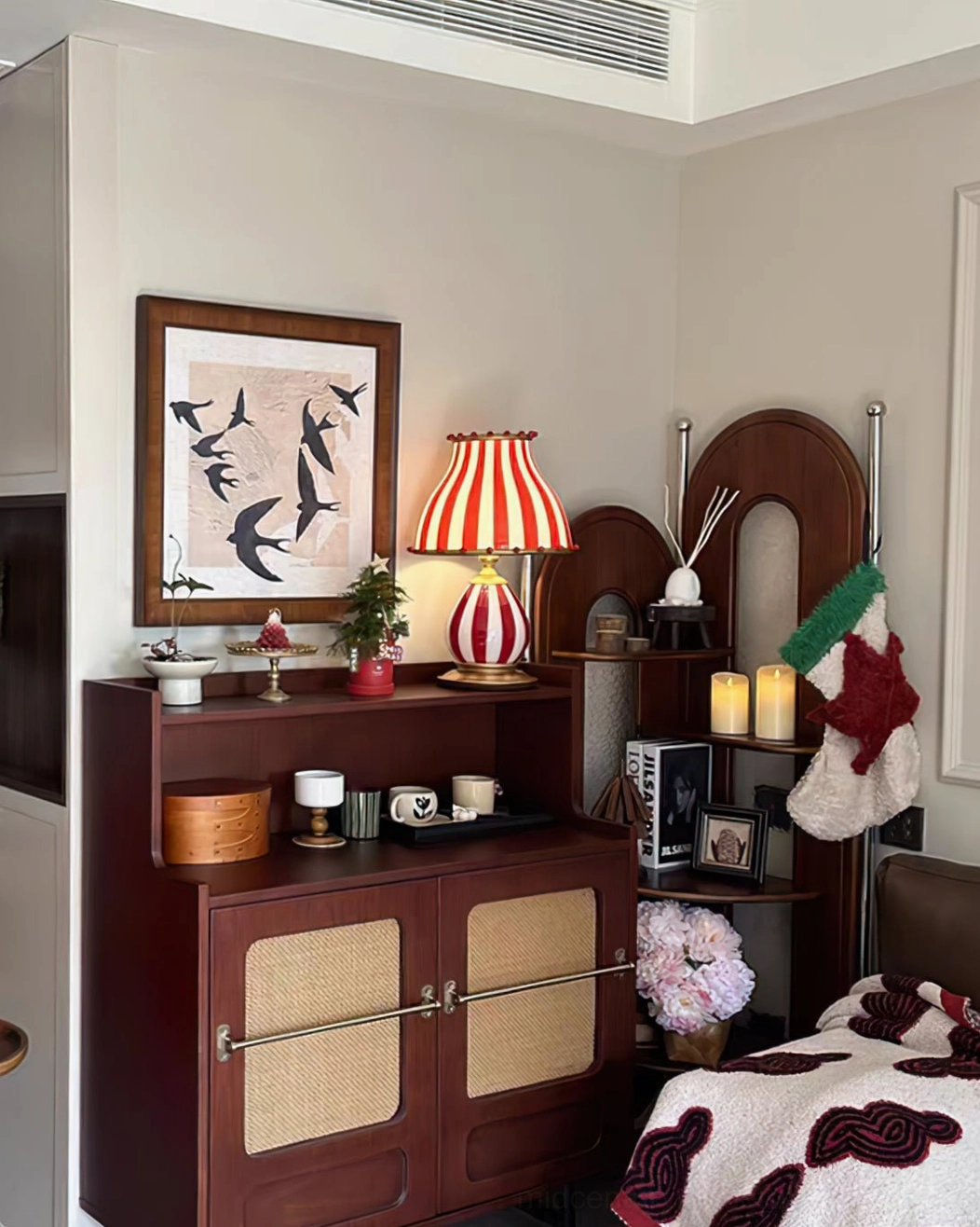 Carnival-inspired red and white striped lamp artistic interior styling arrangement