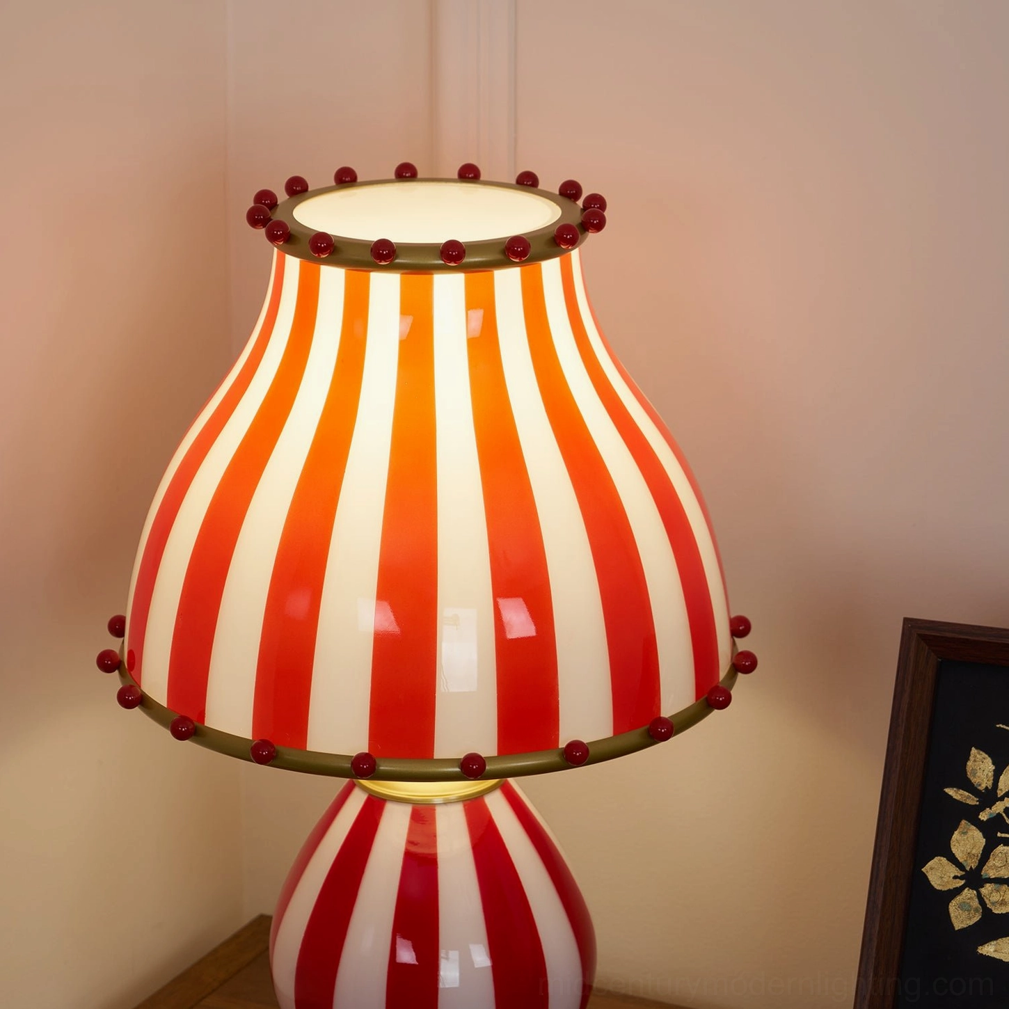 Vintage red and white striped lamp close-up showing paint finish quality and durability