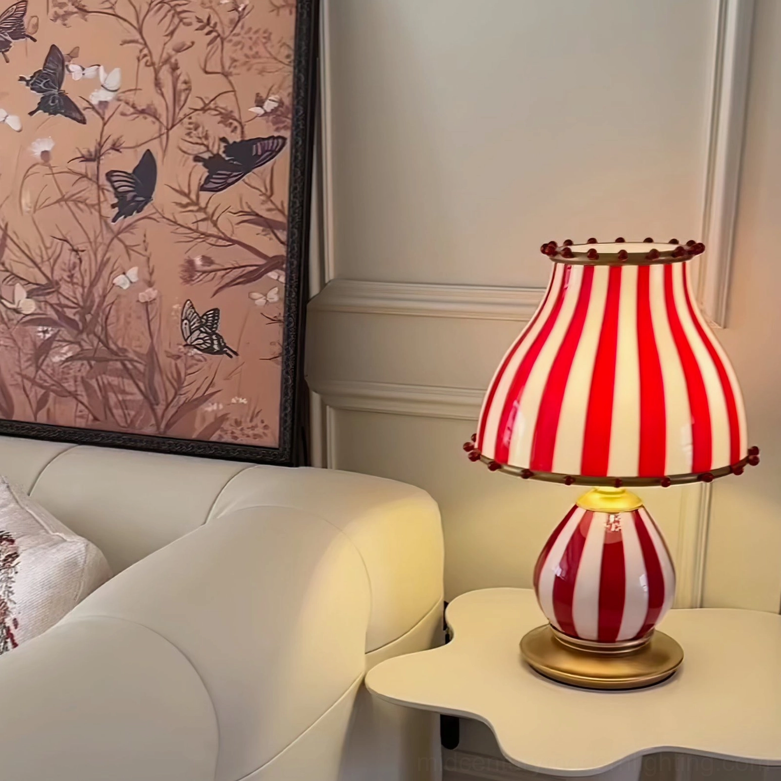 Red and white striped vintage circus lamp top view showing circular pattern detail