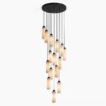 Cirio alabaster cascade chandelier overhead product shot with staggered pendant lights and matte black brass canopy