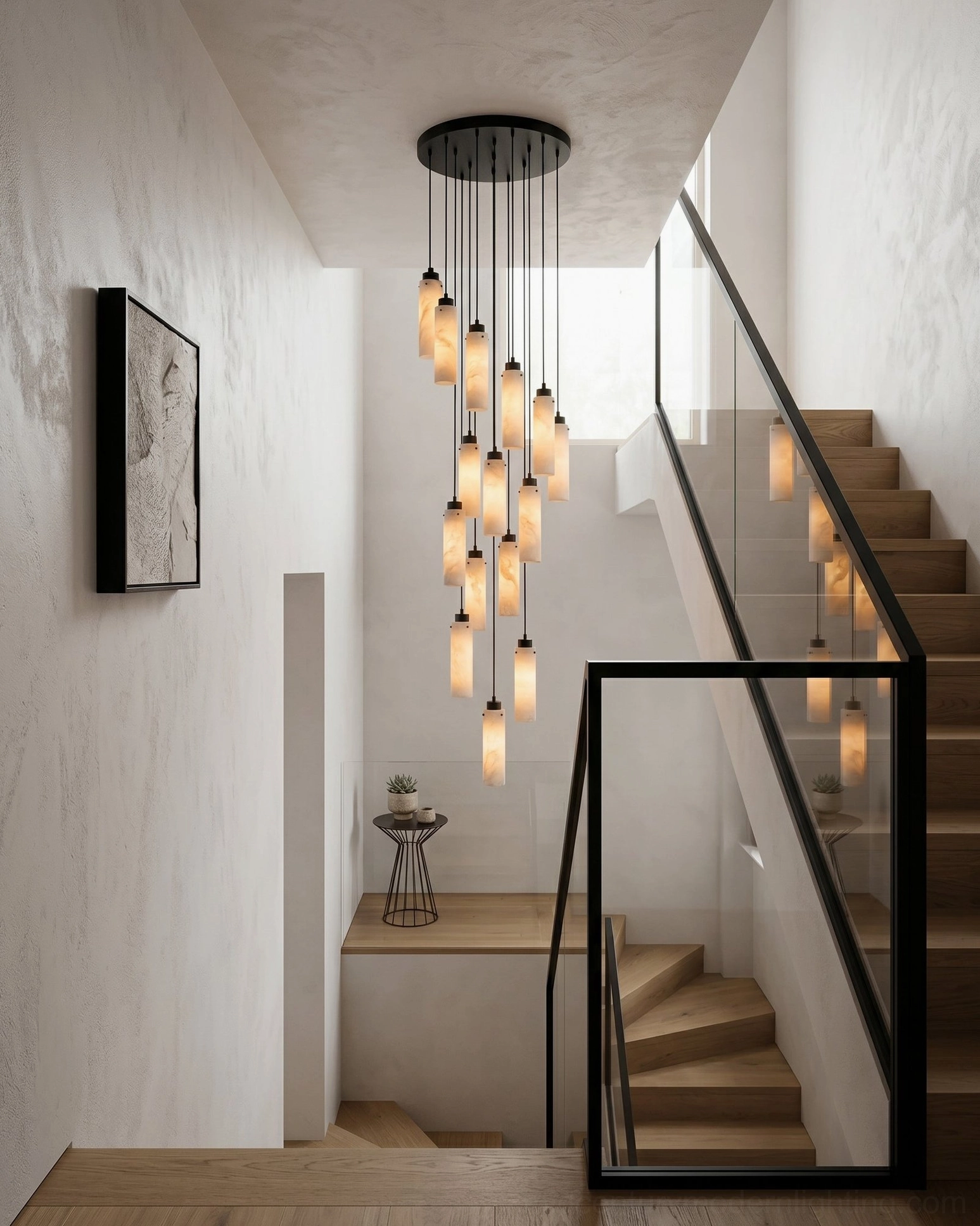 Cirio staggered pendant chandelier suspended above minimalist concrete staircase