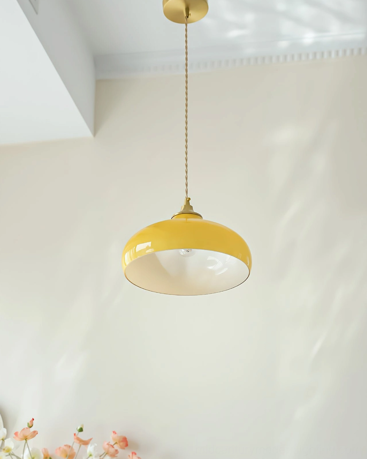 Bottom-up view of Citrine dome pendant showing brass metal canopy and ceiling trim integration