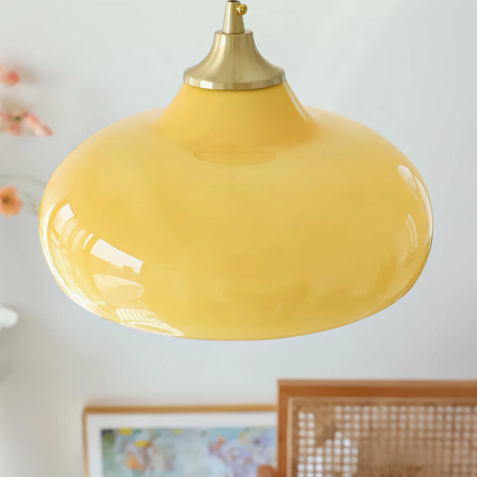 Detailed close-up of Citrine dome pendant showing glossy yellow glass finish and brass metal hardware
