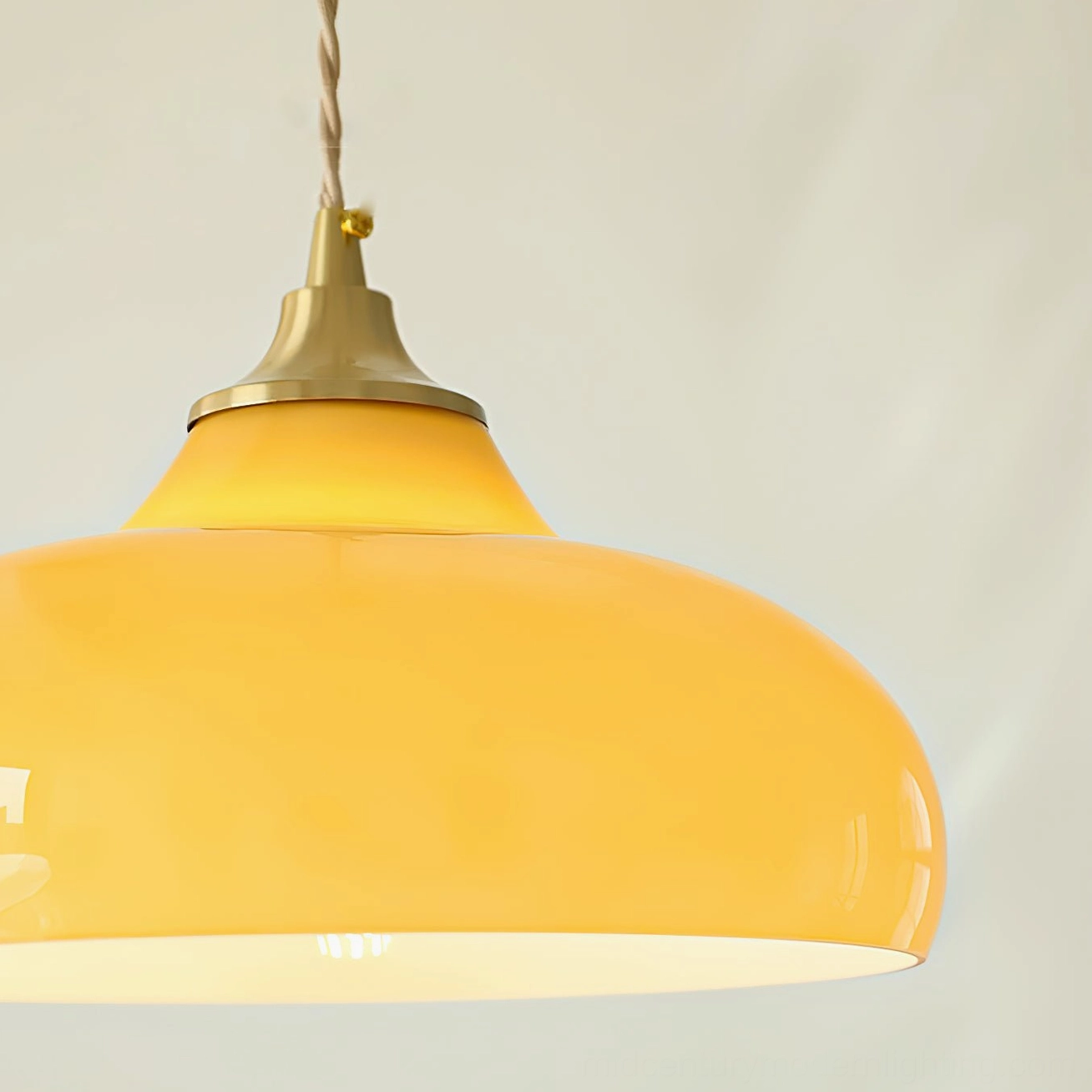 Close-up side angle of Citrine dome pendant showing vintage twisted fabric cord and brass accents