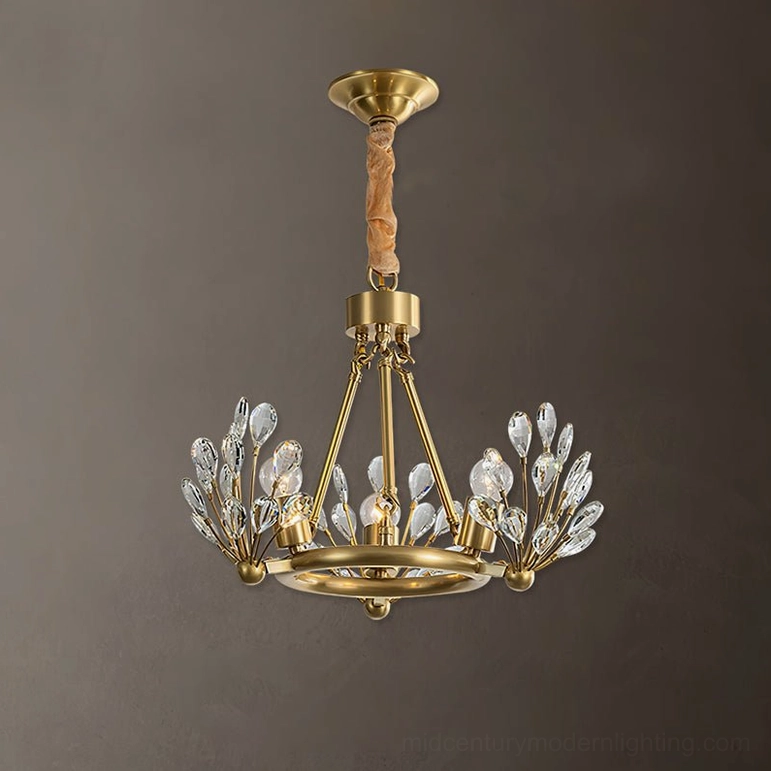 Minimal Clara Crystal Chandelier compact design with brass frame and limited crystal groups, overhead view against neutral gray background