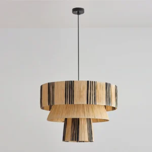 Clarissa woven raffia pendant light, side profile view highlighting layered shade construction and vertical black stripe pattern