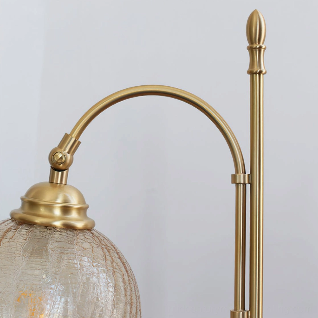 Classic mid-century modern table lamp with textured glass shade, brass hardware, and wooden base