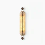 Clayton alabaster wall sconce with bronze finish, front studio view showing geometric design and natural stone shade