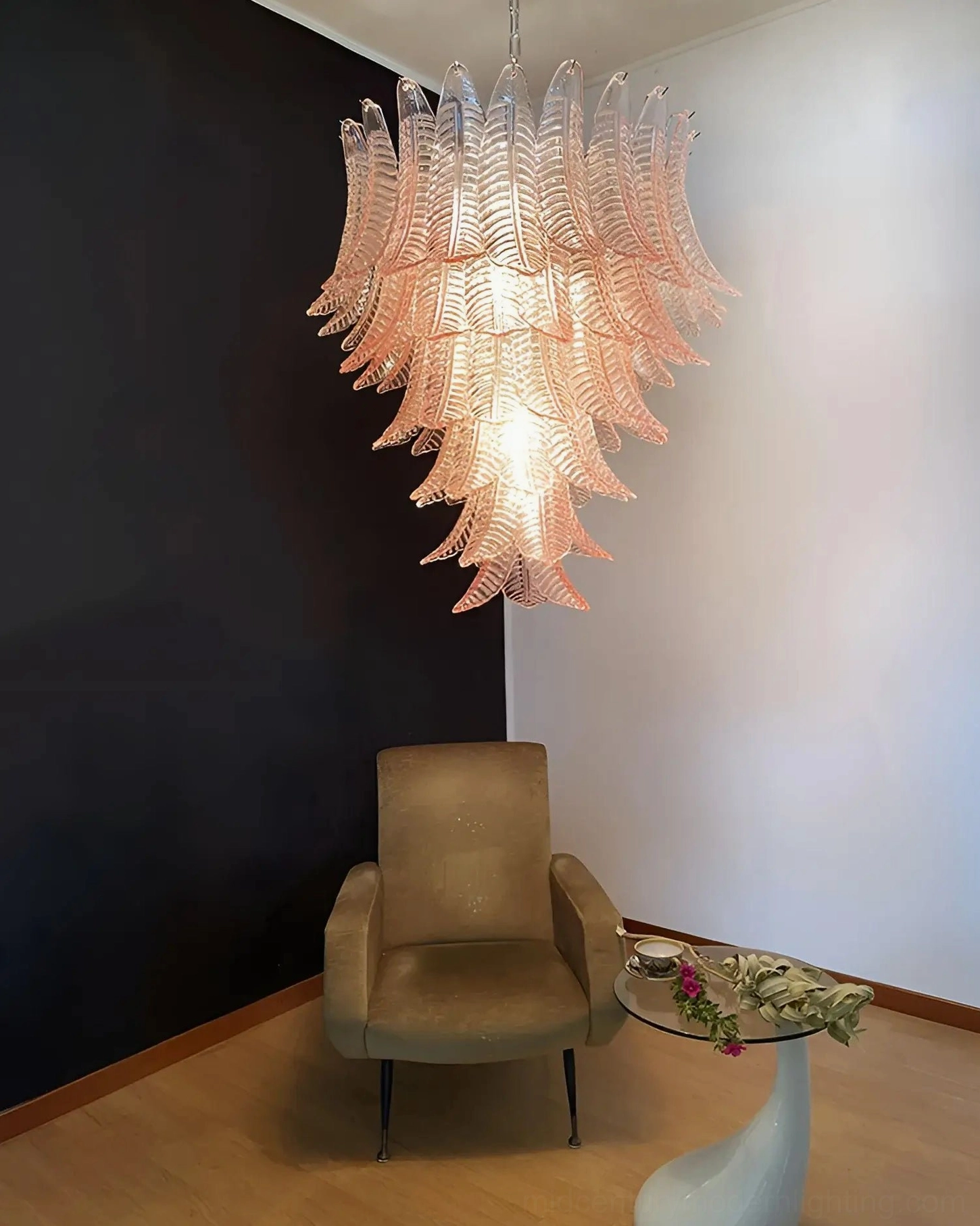 Clear glass palm leaf Murano chandelier studio view with minimalist aesthetic