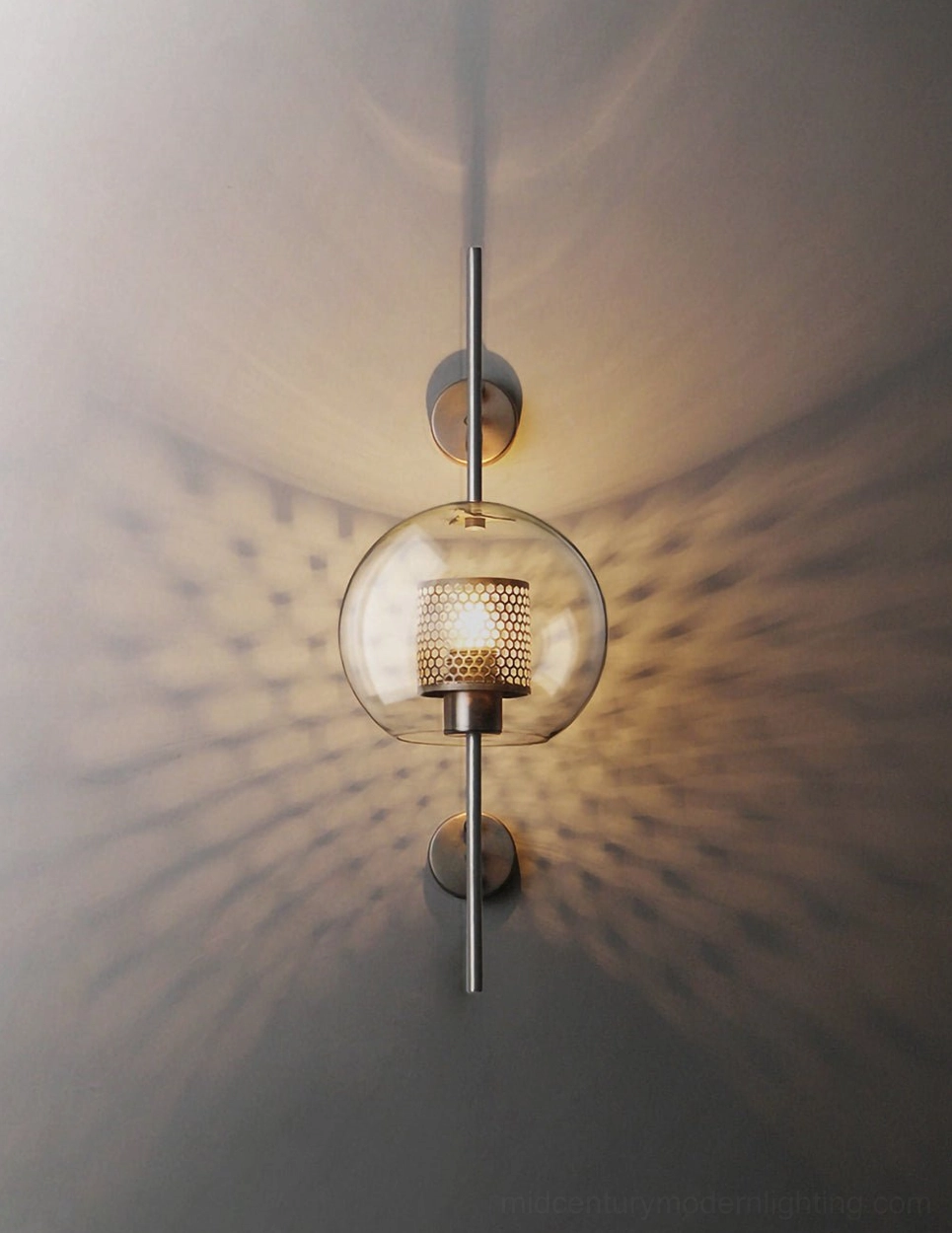 Modern glass wall sconce with clear glass shade and minimalist metal frame