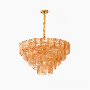 Clementine tiered glass chandelier with amber marbled glass panels and brass hardware, front studio view, mid-century modern sculptural pendant light