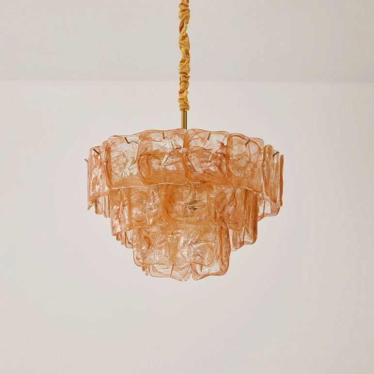 Clementine tiered glass chandelier detail shot showing textured glass panels and metal frame construction, product photography