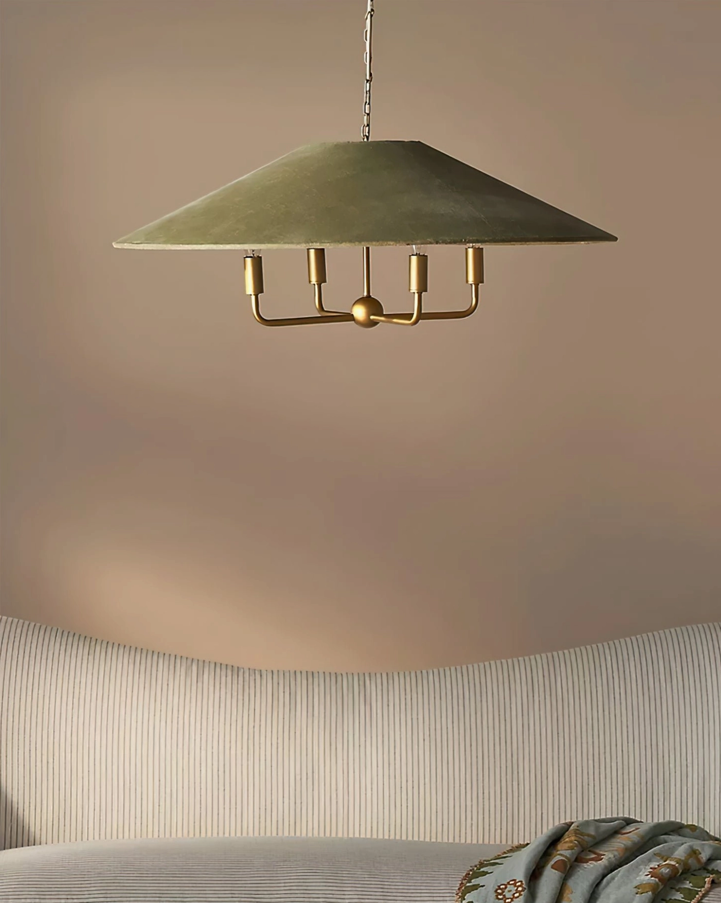 Clivedon pendant with warm ambient lighting in residential living room interior
