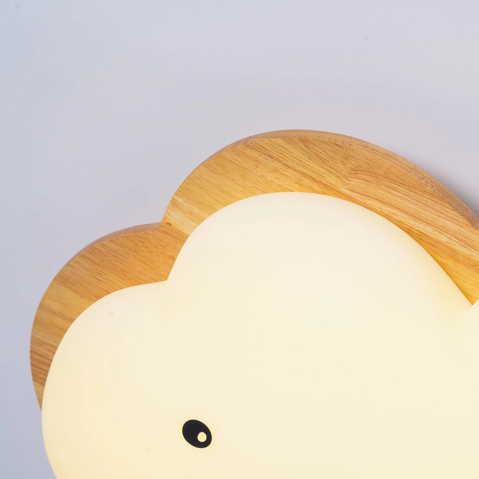 Smiling cloud ceiling light fixture showcasing natural wood and white acrylic materials in bedroom setting