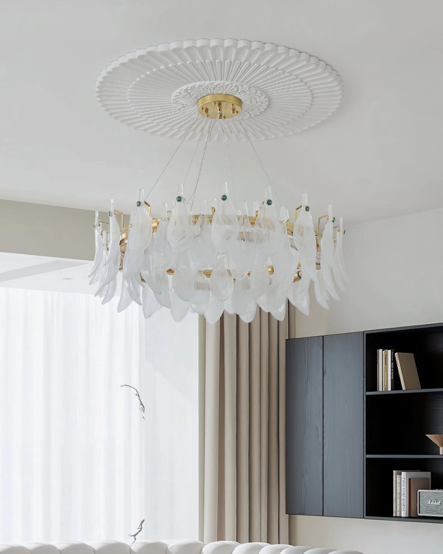 Round cloud glass chandelier with frosted petals installed on minimalist modern ceiling