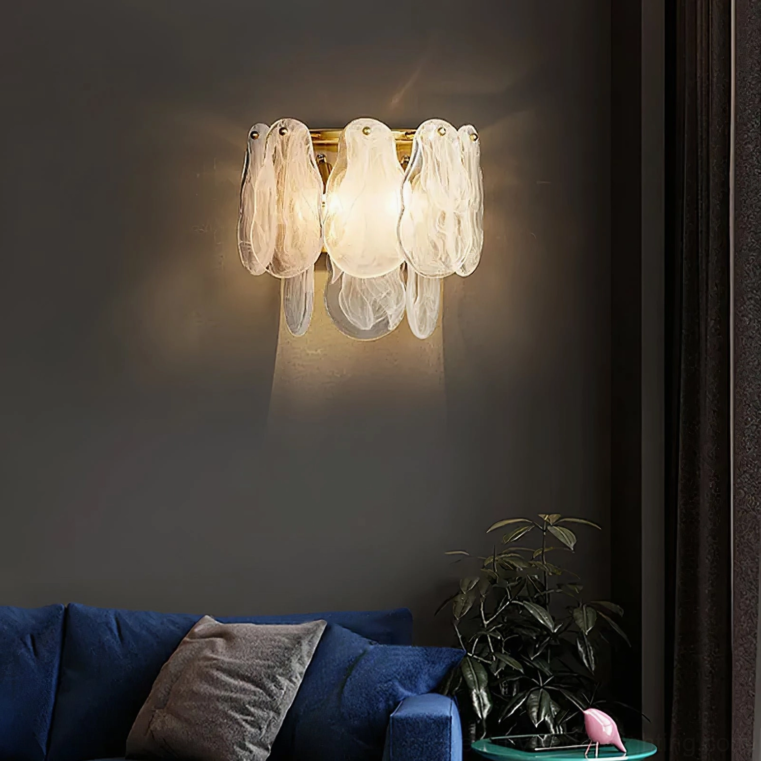 Cloud glass wall sconce product shot showing complete fixture with frosted petal shades and brass gold finish