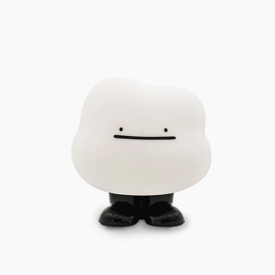 Cloud Night portable LED table lamp with organic soft cloud silhouette, matte white finish with black base, front overhead studio view on white backdrop