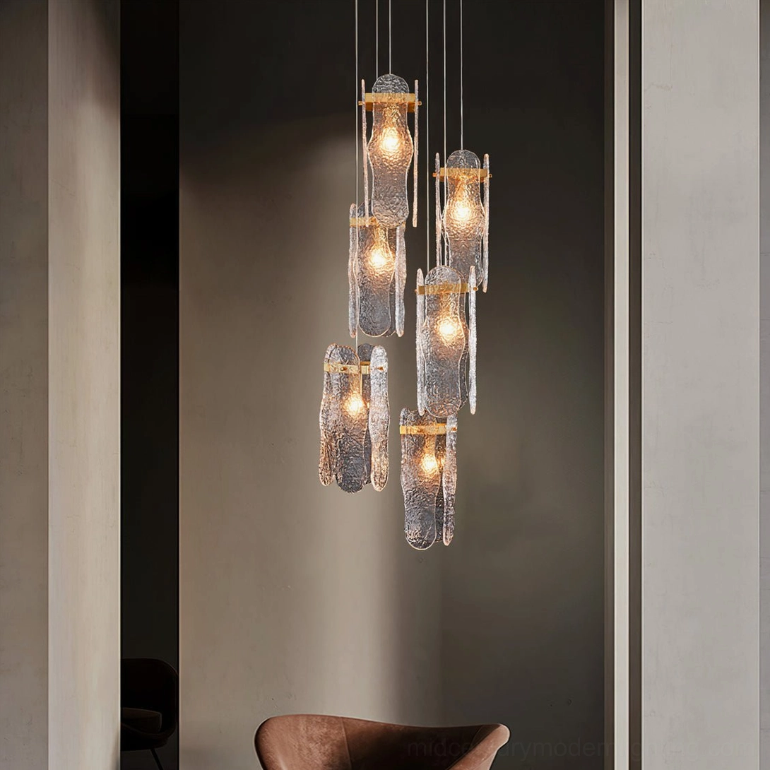 Multiple stacked glass pendant lamps modern entryway brass hardware warm bulbs