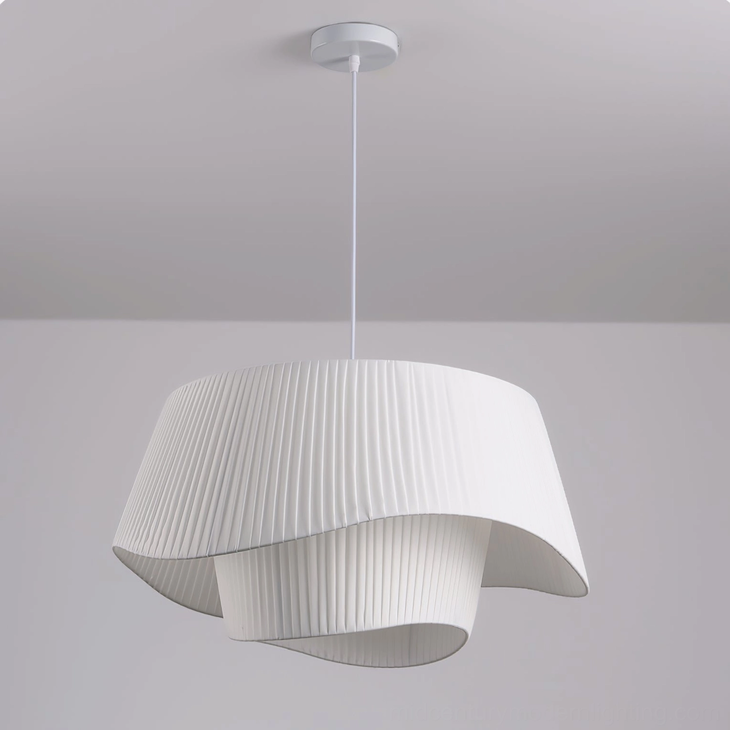 Coco pleated pendant lamp paired with botanical plants and curated art collections design