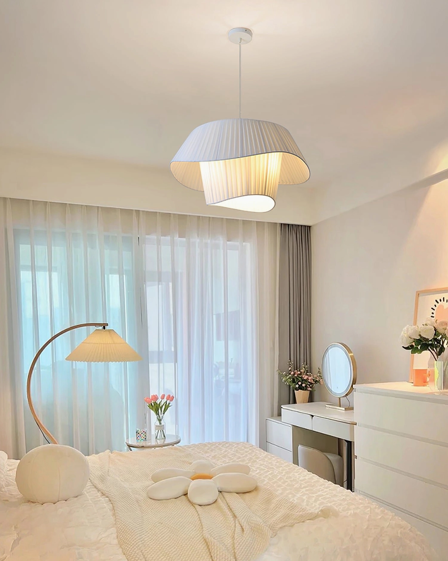 Coco pleated pendant lamp in Scandinavian interior with warm wood tones and natural materials