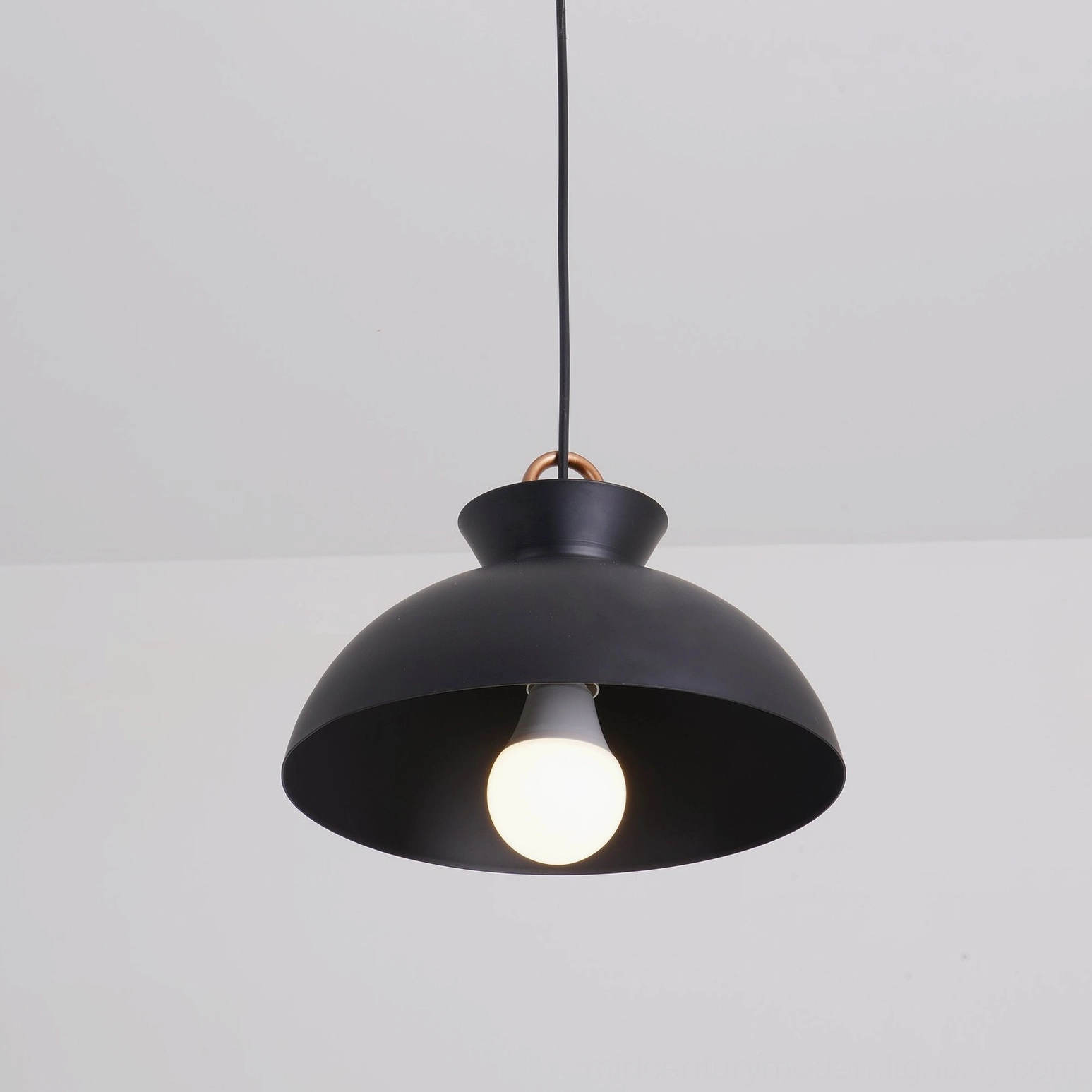 Coil suspension pendant lamp mid-century modern style in contemporary home setting
