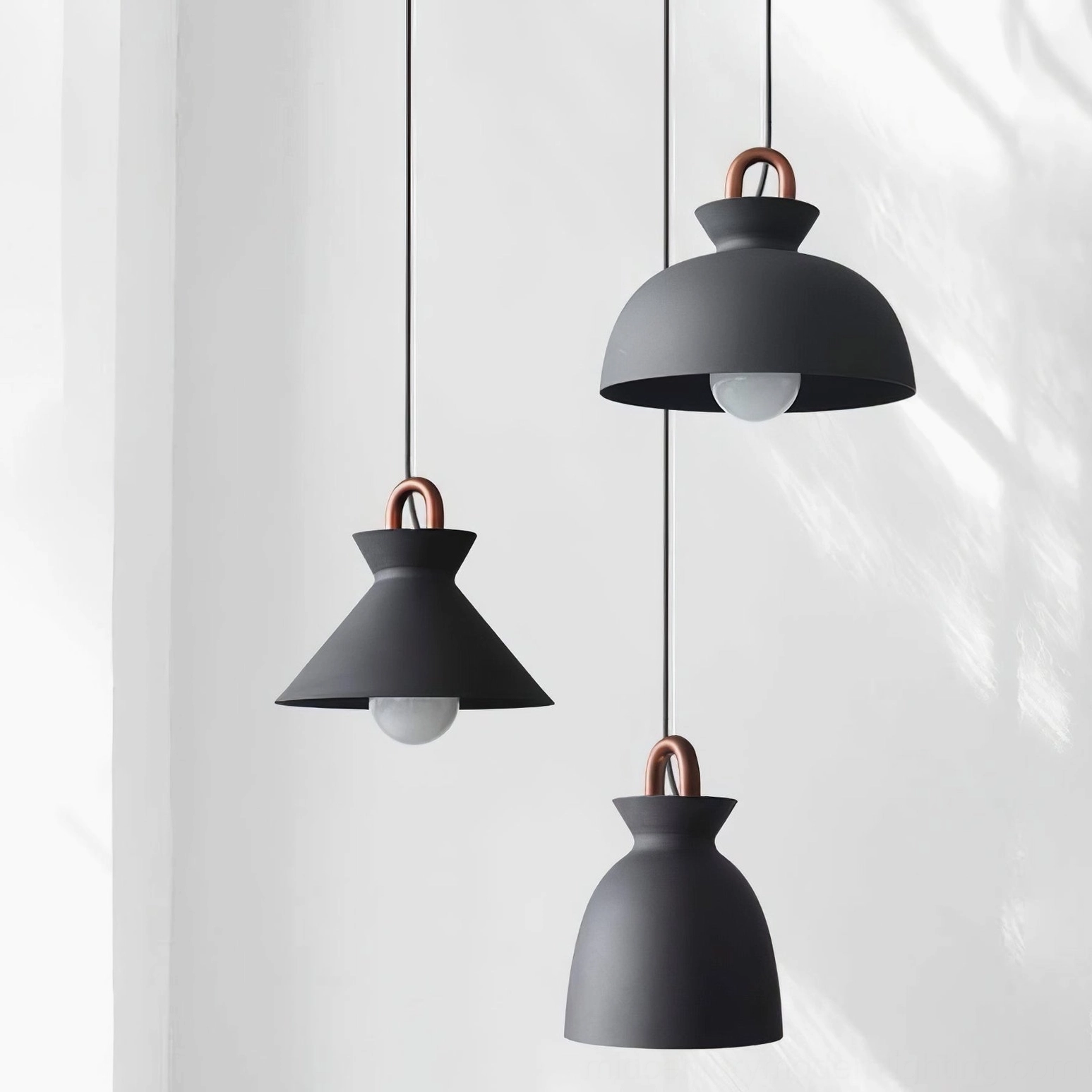 Coil pendant light fixture detail showing premium construction and finish quality