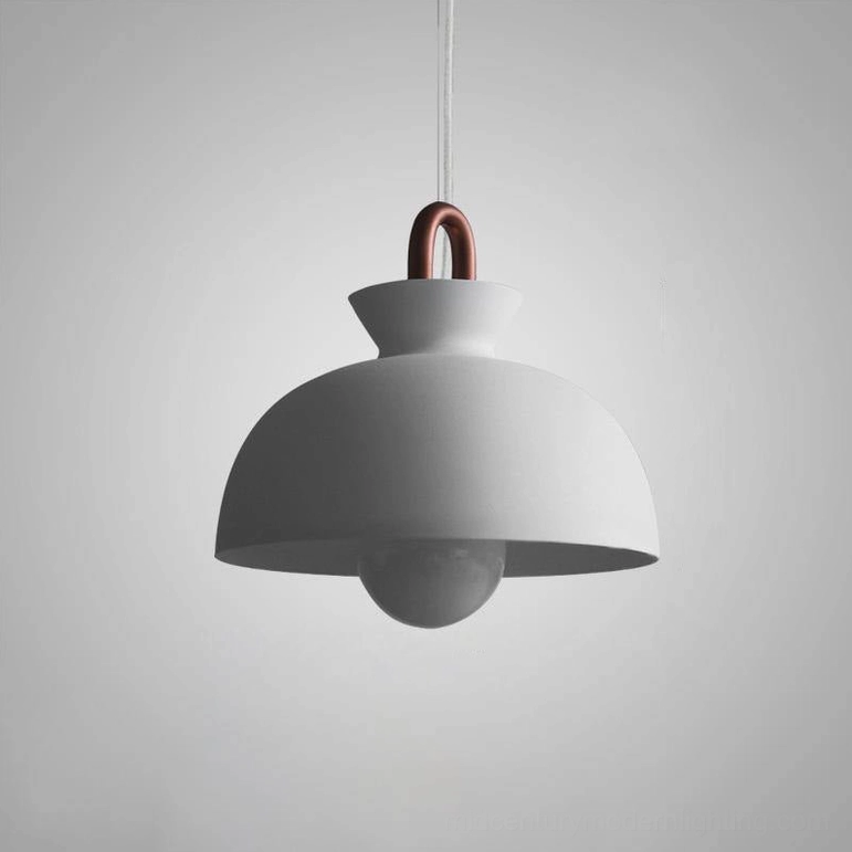 White coil pendant light fixture displaying clean minimalist form and elegant design