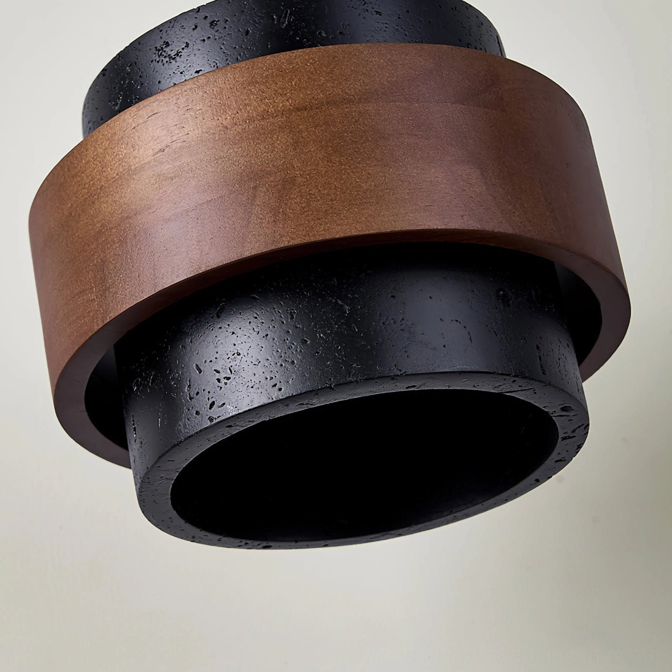 Cole Travertine flush mount fixture rear close-up showing internal cavity and dual-tone layered structure