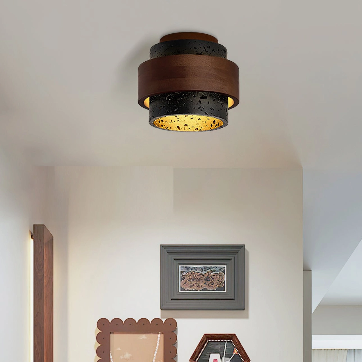 Cole Travertine modern ceiling light installed in vintage entryway with warm ambient glow and minimalist wall decor
