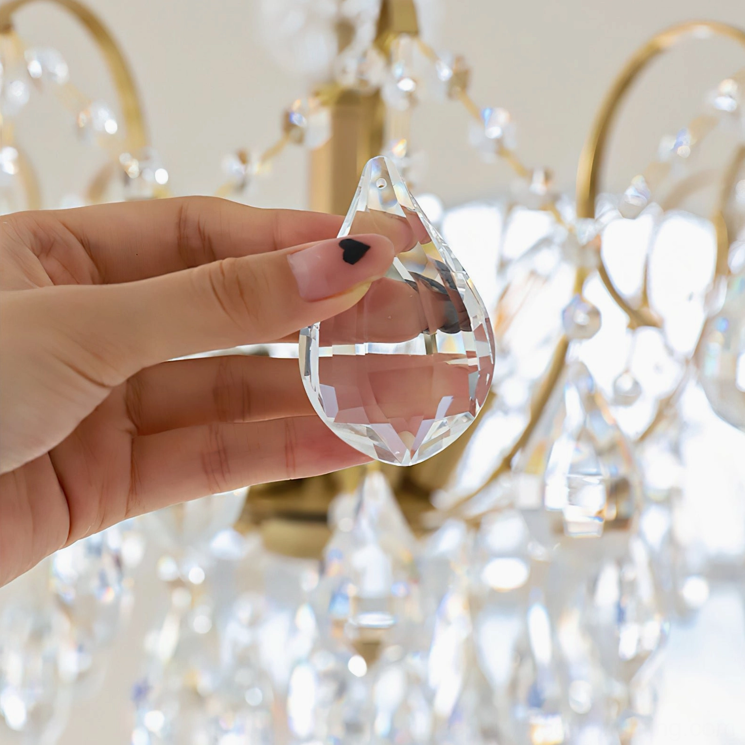Colette Crystal Chandelier demonstrating luxurious crystal clarity and refined brass craftsmanship