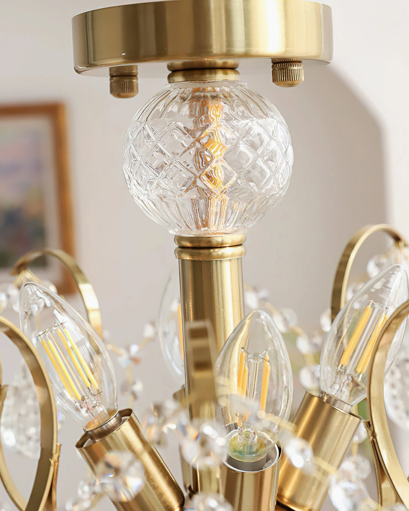 Colette Chandelier in foyer or entryway creating dramatic focal point with cascading crystals