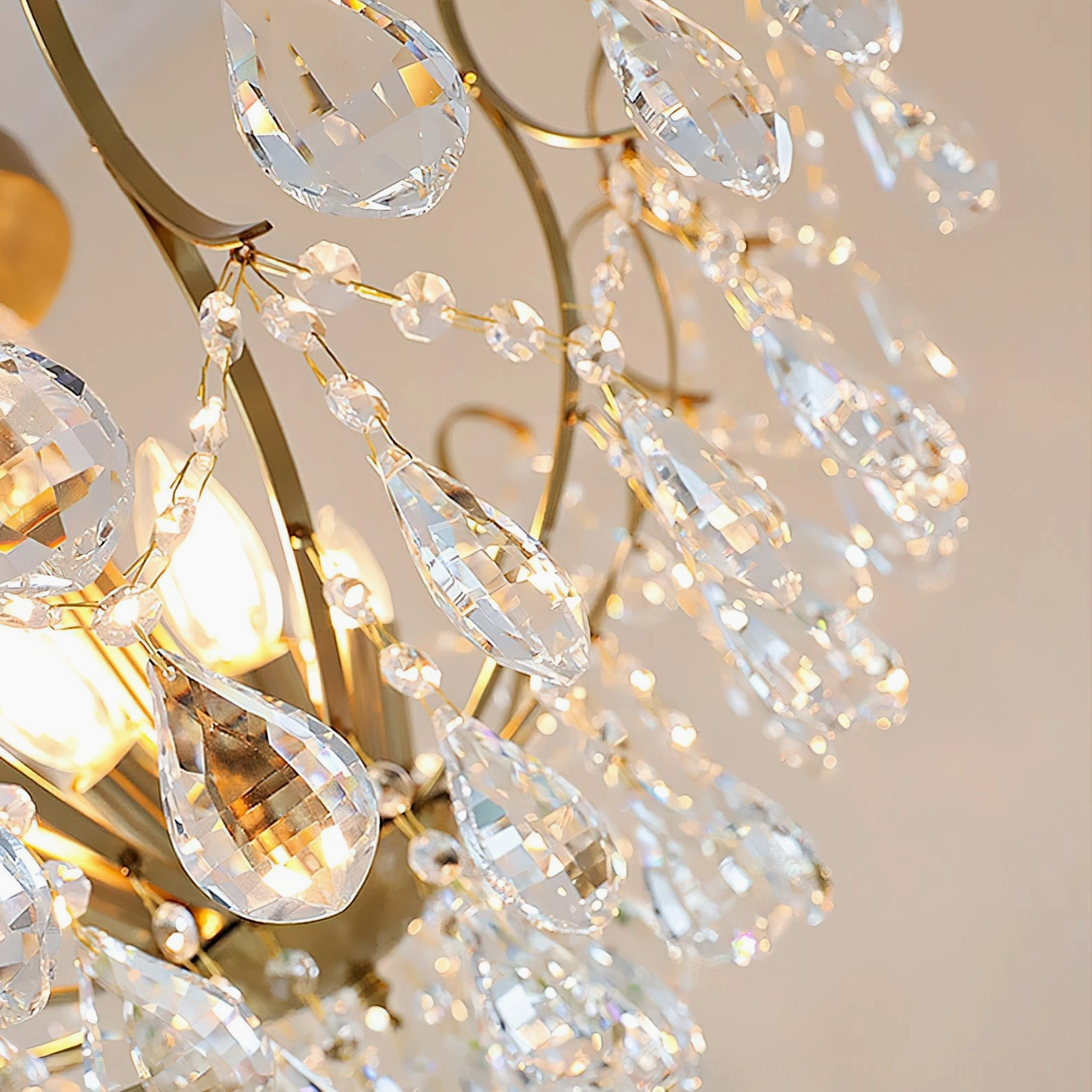 Colette Crystal Chandelier front view showcasing delicate feminine silhouette and polished brass arms