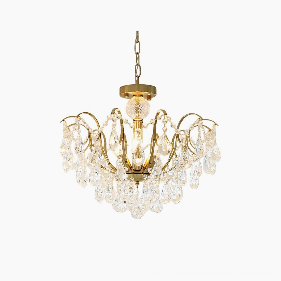 Colette Crystal Chandelier with polished brass frame and cascading faceted crystal prisms, front studio view