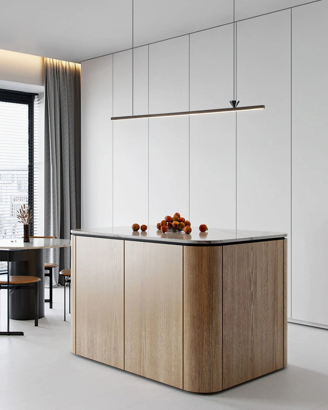 Contemporary linear pendant light in bright modern kitchen with wooden island