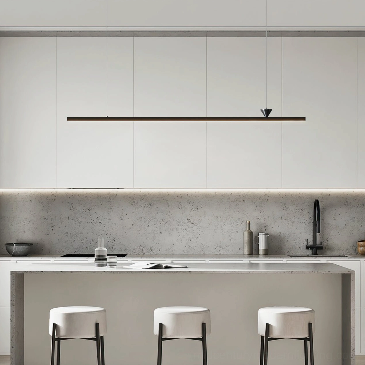 Contemporary black linear pendant above kitchen island with white cabinetry