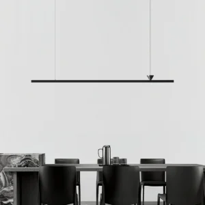 Modern black linear pendant chandelier above dining table in contemporary dining room