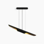 Coltrane linear pendant light with black matte exterior and gold interior, front overhead studio view
