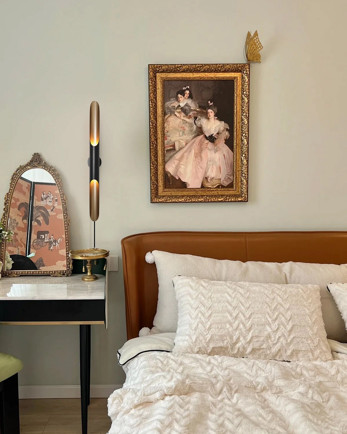 Coltrane vanity wall sconces in bedroom, warm romantic ambient lighting tufted bed
